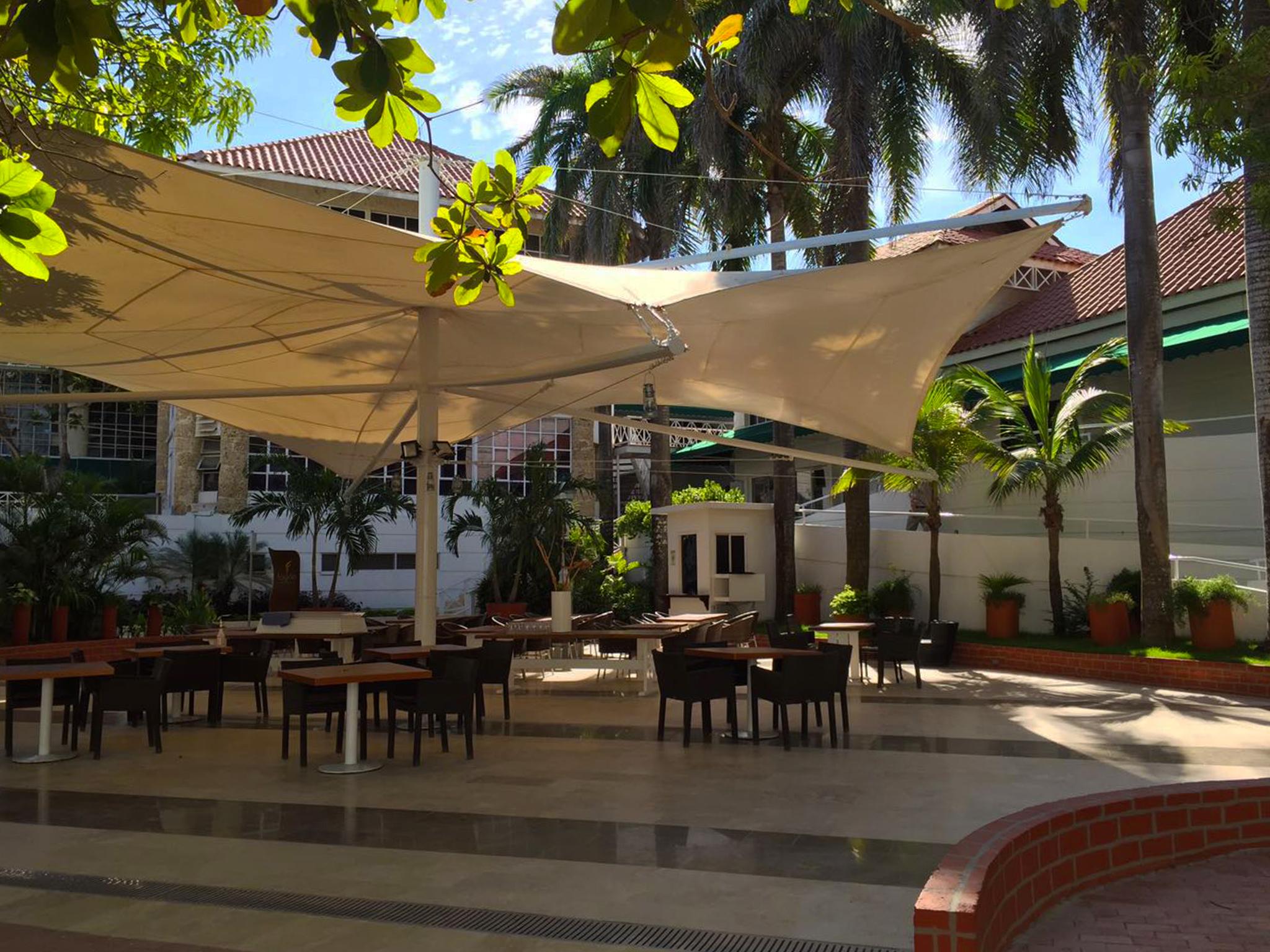Hotel Las Americas Casa De Playa Cartagena Exterior photo The courtyard of the hotel