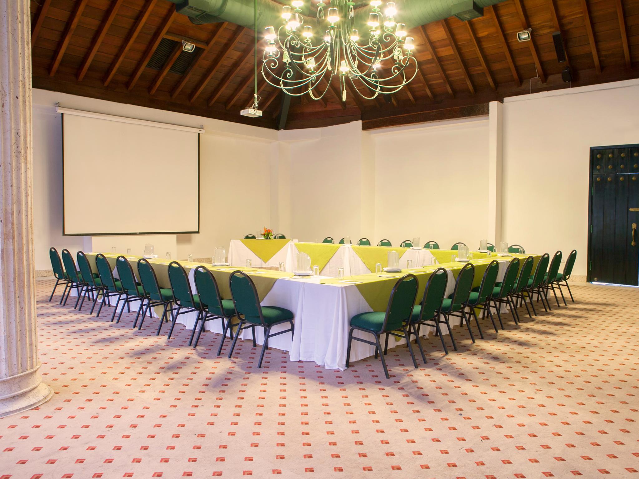 Hotel Las Americas Casa De Playa Cartagena Exterior photo The meeting room