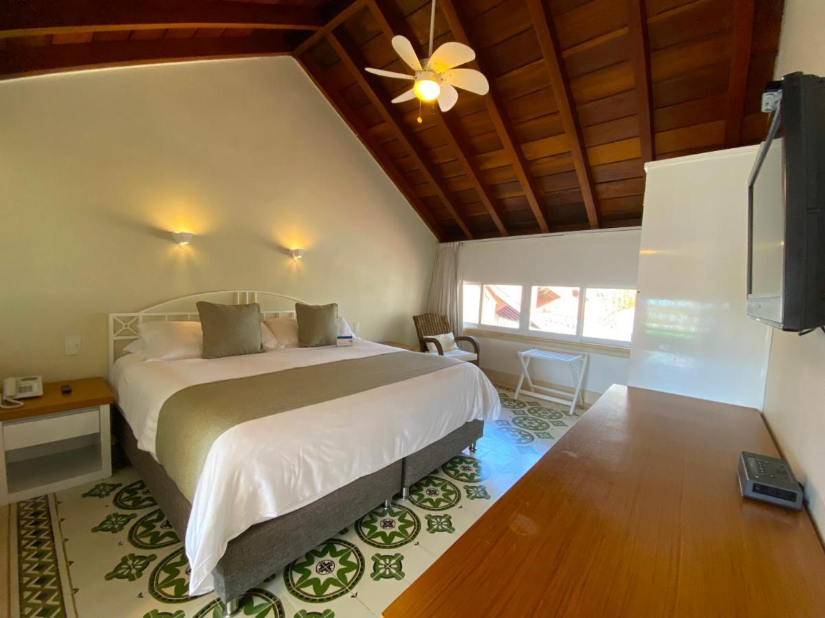 Hotel Las Americas Casa De Playa Cartagena Exterior photo A room at the hotel